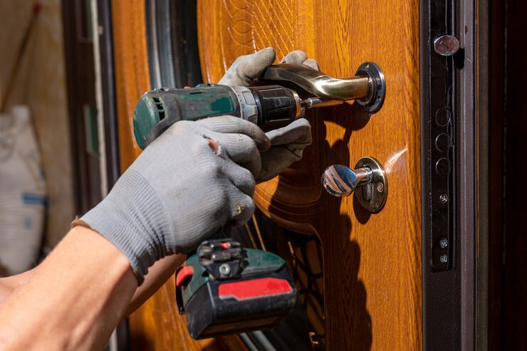 master-worker-installs-lock-front-door-metal-doors-with-polymer-coating-secure-key-pros